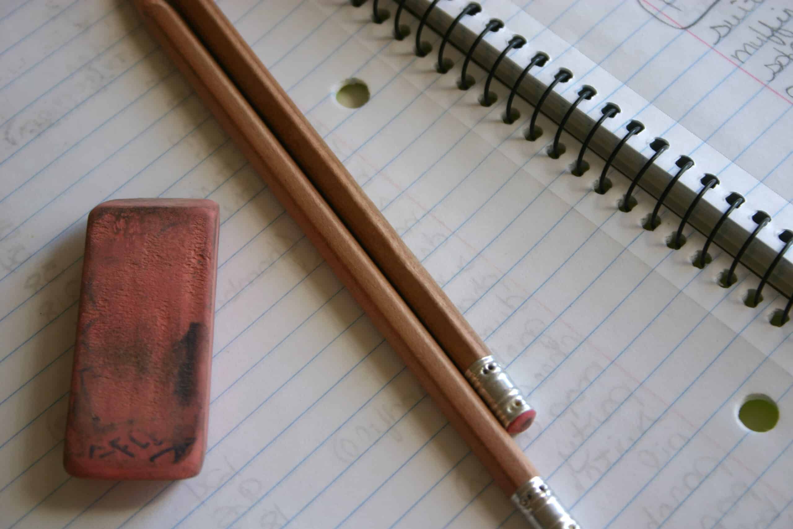 Pencil, notebook and eraser