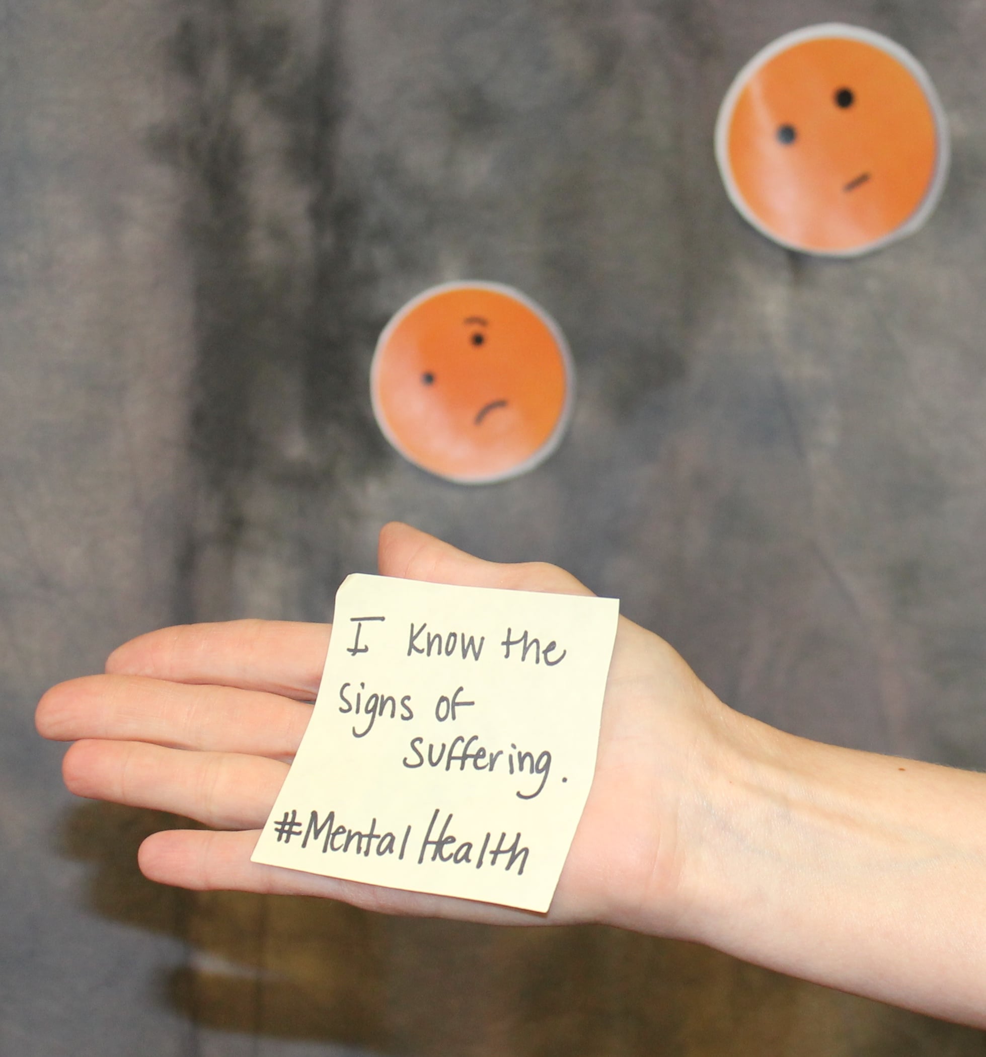 Signs-of-Suffering-note-in-hand