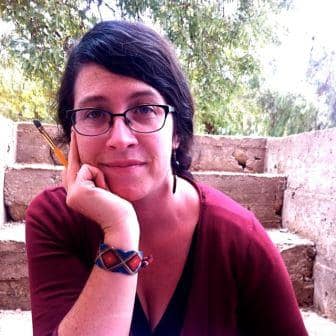 woman-red-shirt-glasses-black-hair-watch