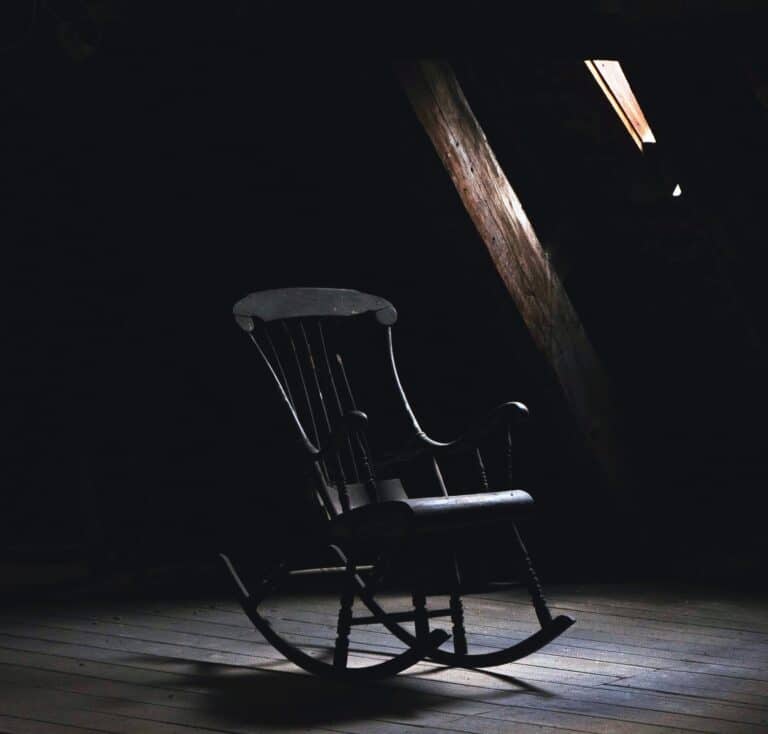 rocking-chair-dark-small-window-light