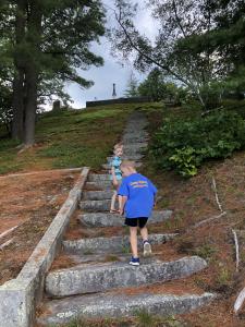 two-boys-stone-steps-trees