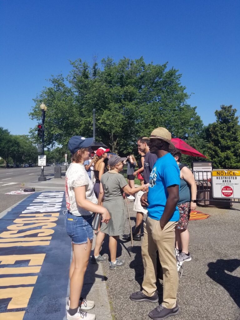 two-facing-lines-protesters