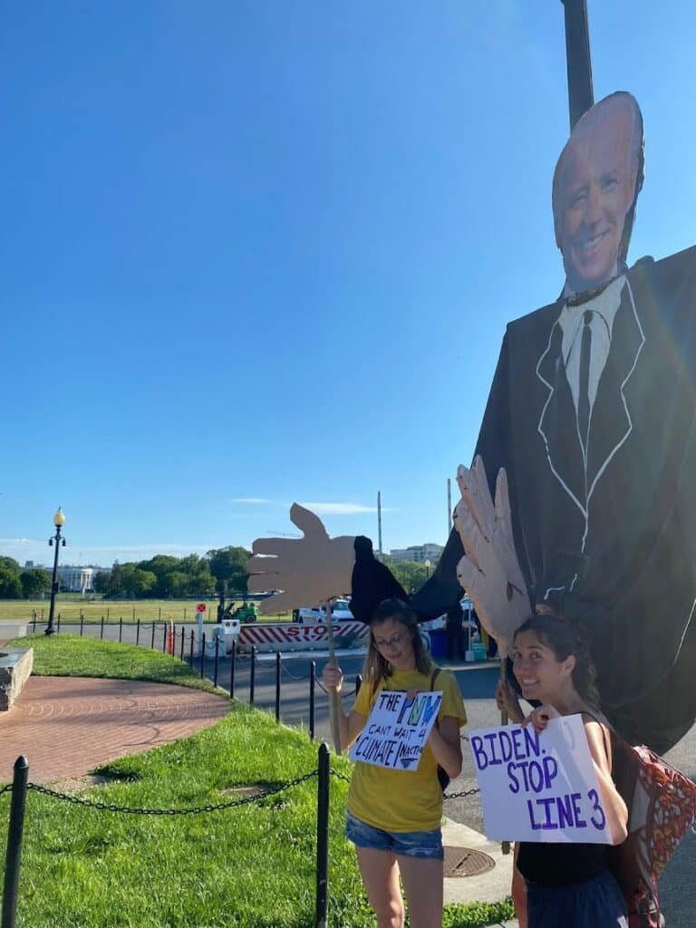 joe-biden-cutout-two-protesters