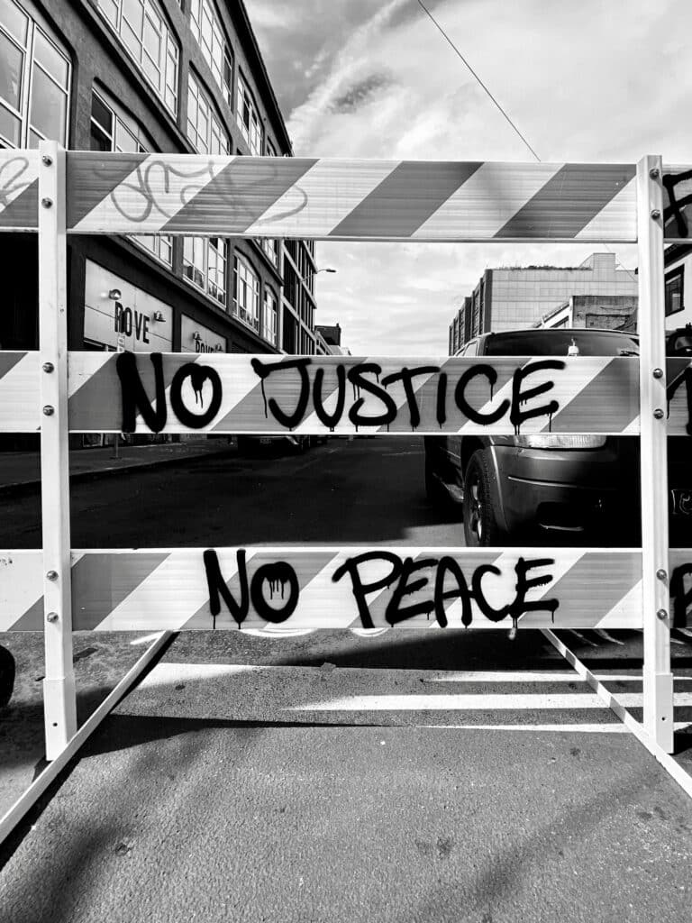 black-white-road-barrier-no-justice-no-peace