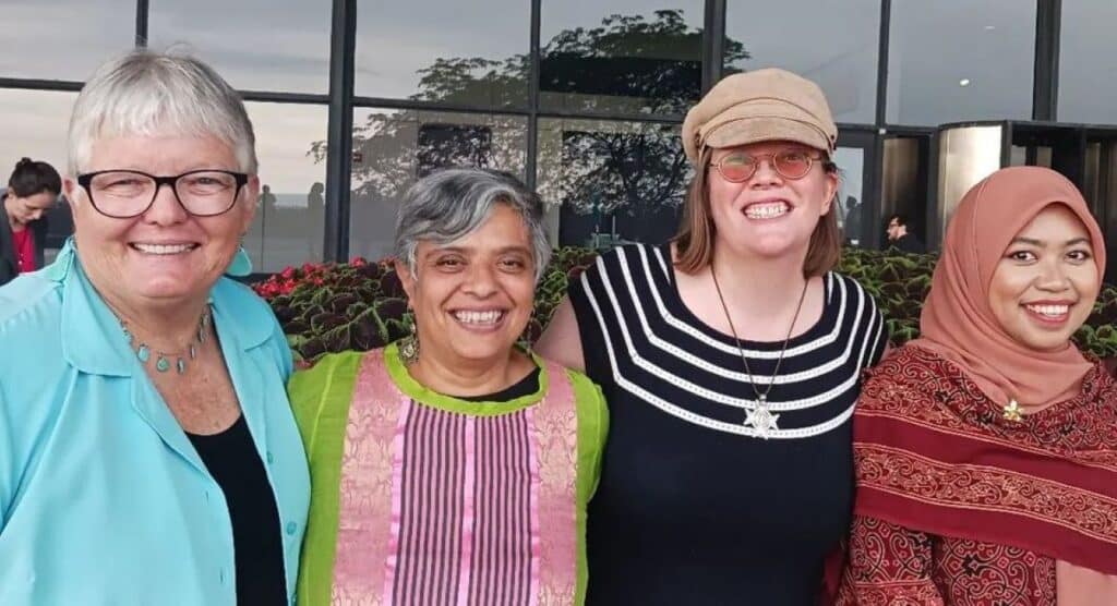 Deepa Patel, Tessa Bielecki and Ustazah Liyana R. Asmara join panelist moderator, Sister  Julia Walsh, in conversation about  "Creating Inclusive and Creative Spaces"
at the 2023 Parliament of the World's Religions on Aug. 14 in Chicago, Illinois. Photo by Benny Oon and David Denny.