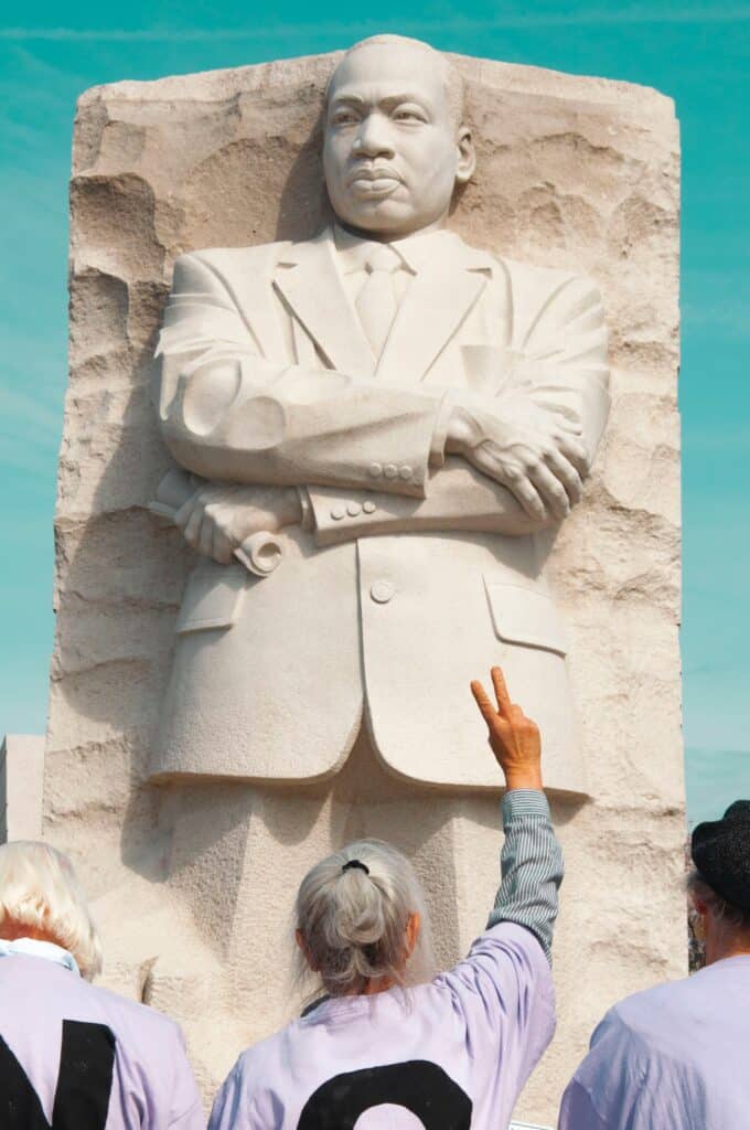 martin-luther-king-junior-stone-carving-woman-peace-sign