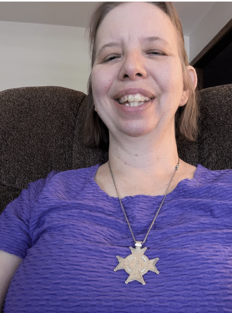 Sr. Sarah Hennessey wearing an FSPA medal