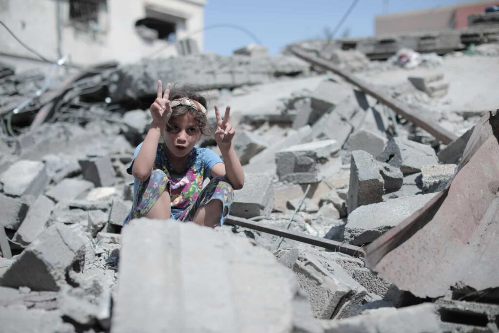 A child among rubble in Gaza